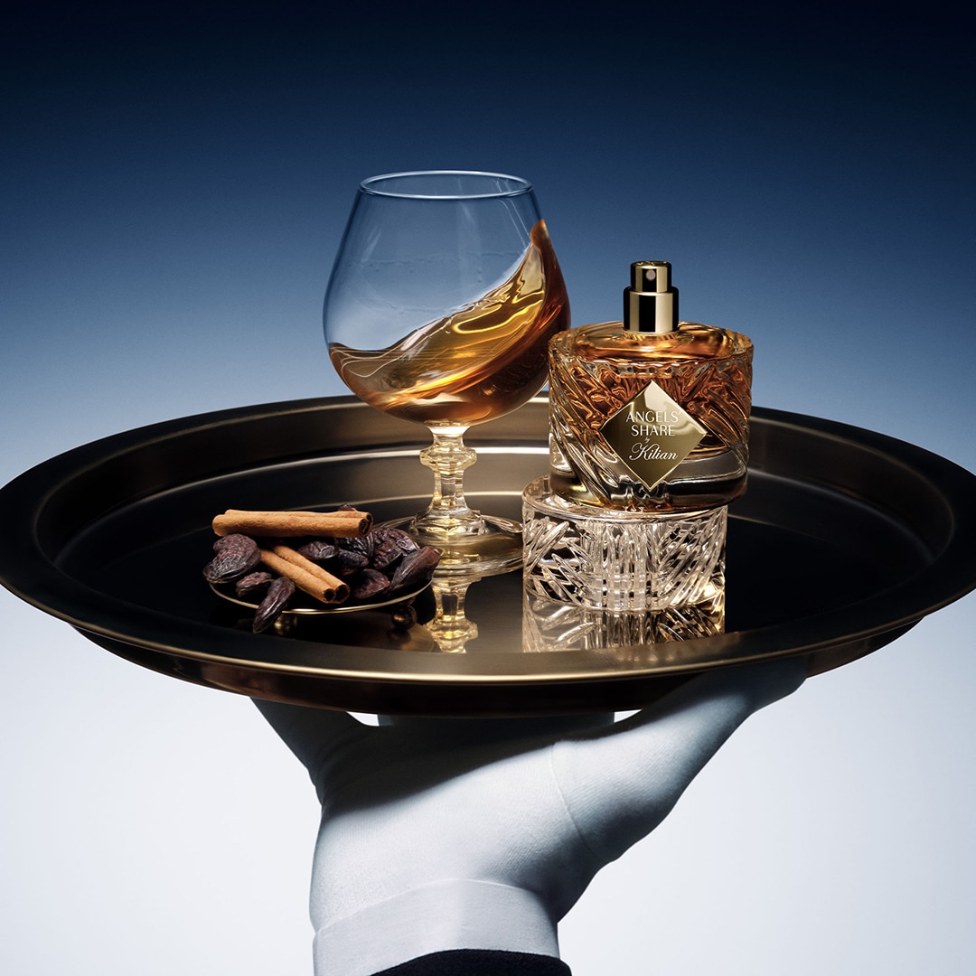 tray wtih glass and perfume